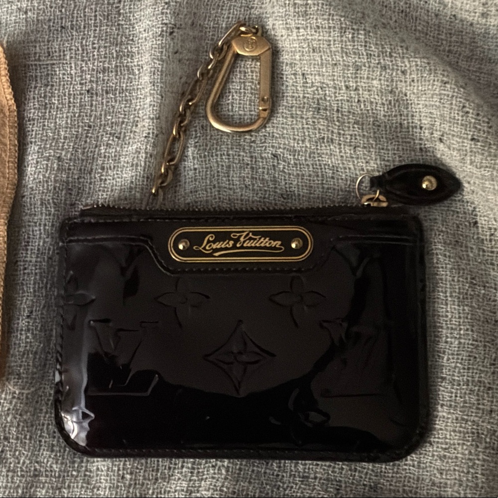 Louis Vuitton Glossy brownish, maroon Monogram Key Pouch